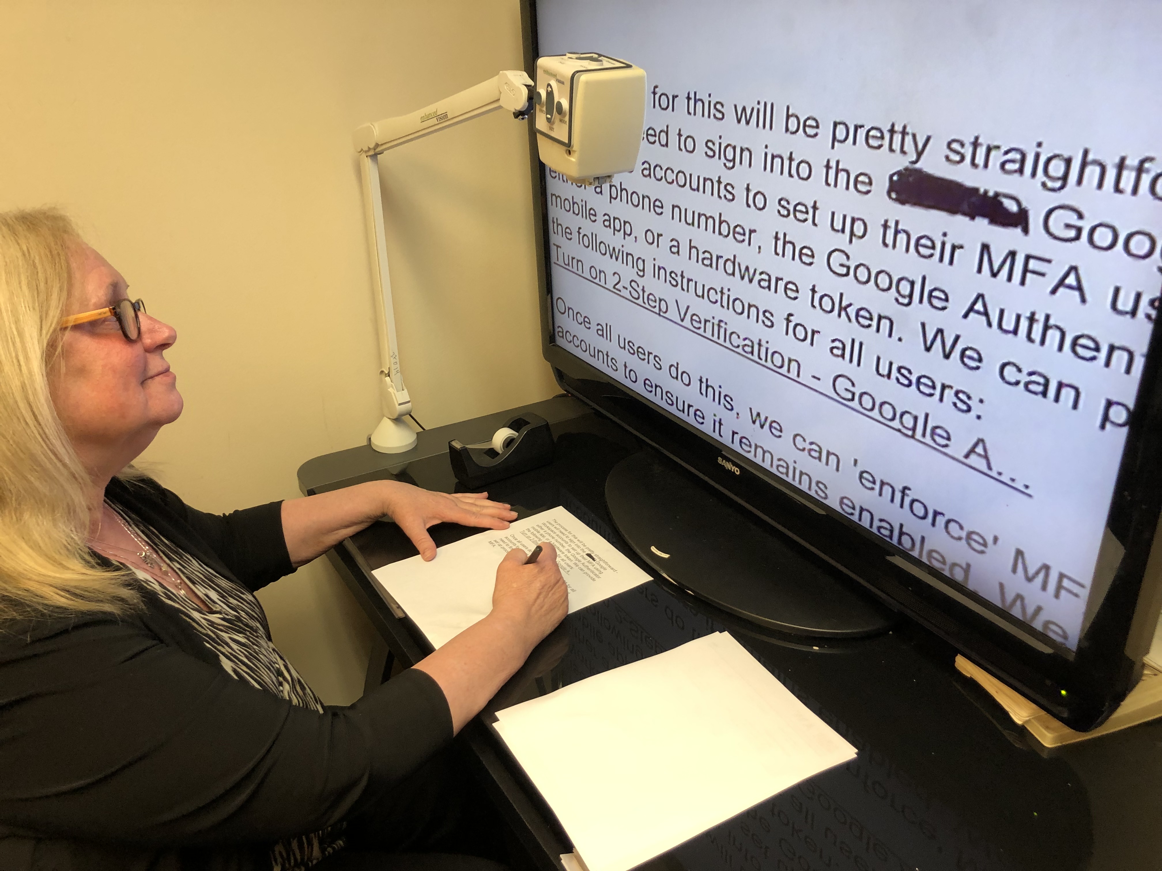 Woman using screen magnifier